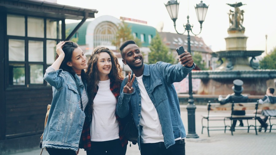 Friends taking a group selfie