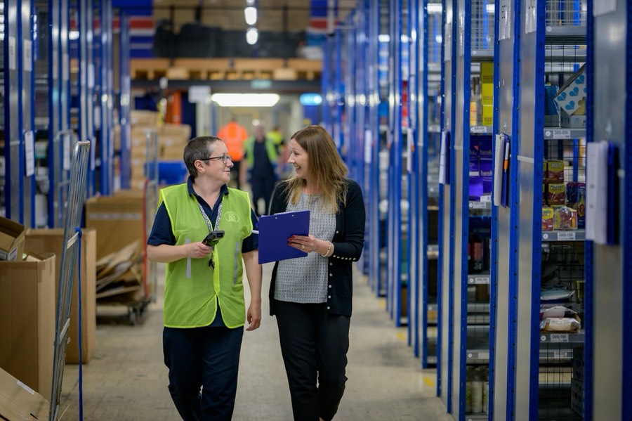 Team checking stock in a warehouse